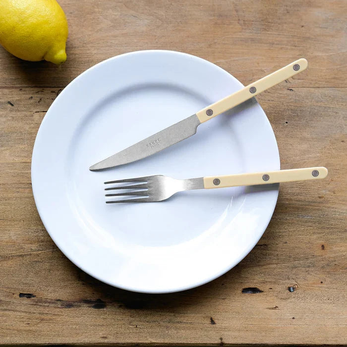 Sabre Paris Vintage Bistrot 4-piece cutlery set in ivory, styled on table