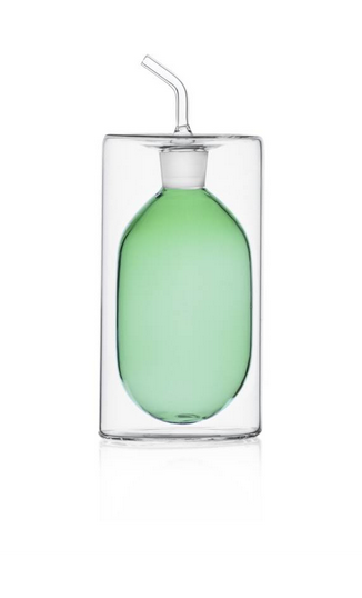 Stylish 2 walled glass oil bottle. Clear glass with green interior 250 ml capacity. Hand made and flame worked.
Oil,Vinegar, Syrup dispenser.
Use-Kitchen to table.