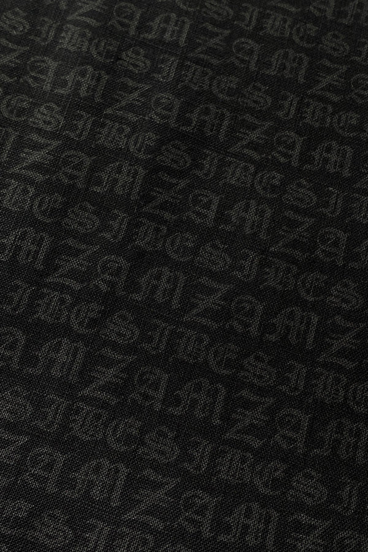 Zambesi Hallmark cushion in jet, close-up of linen print