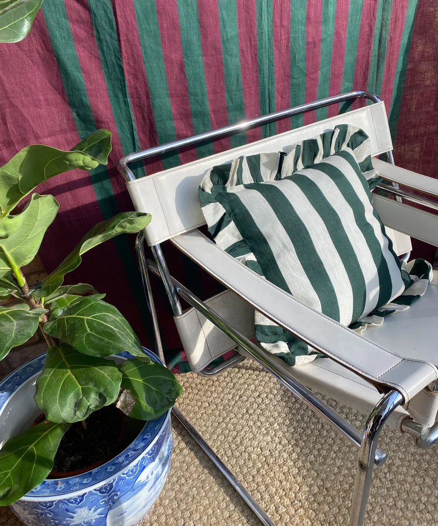 Forest green wide stripe linen cushion cover, close-up of fabric