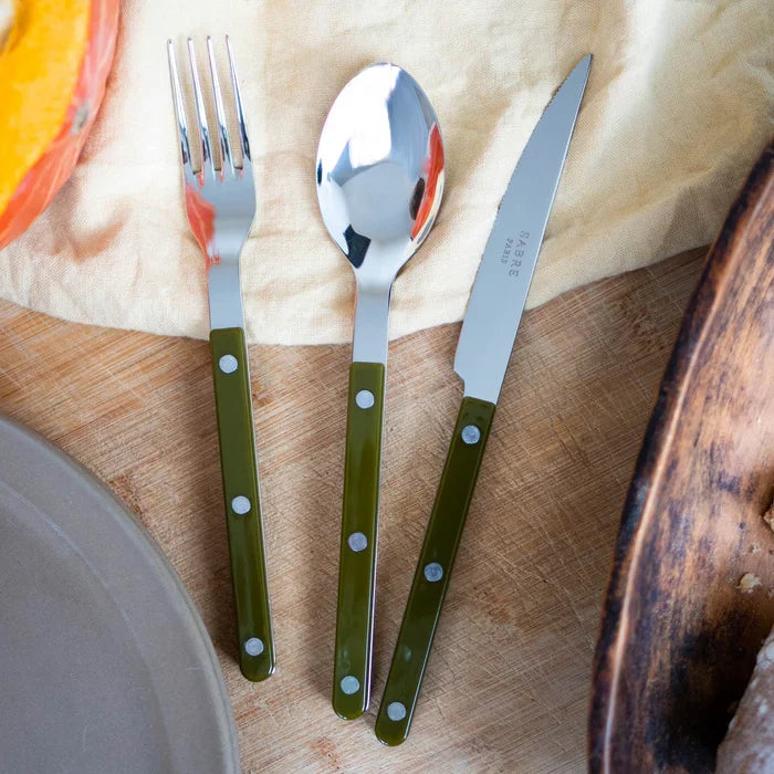 Sabre Paris Shiny Bistrot 4-piece cutlery set in fern green, styled on table