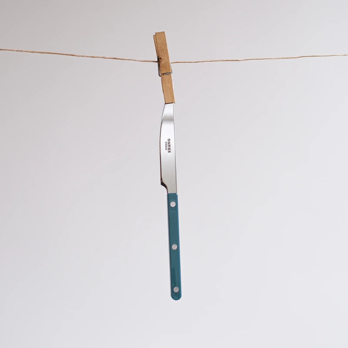 Sabre Paris Shiny Bistrot 4-piece cutlery set in aquamarine, flat lay