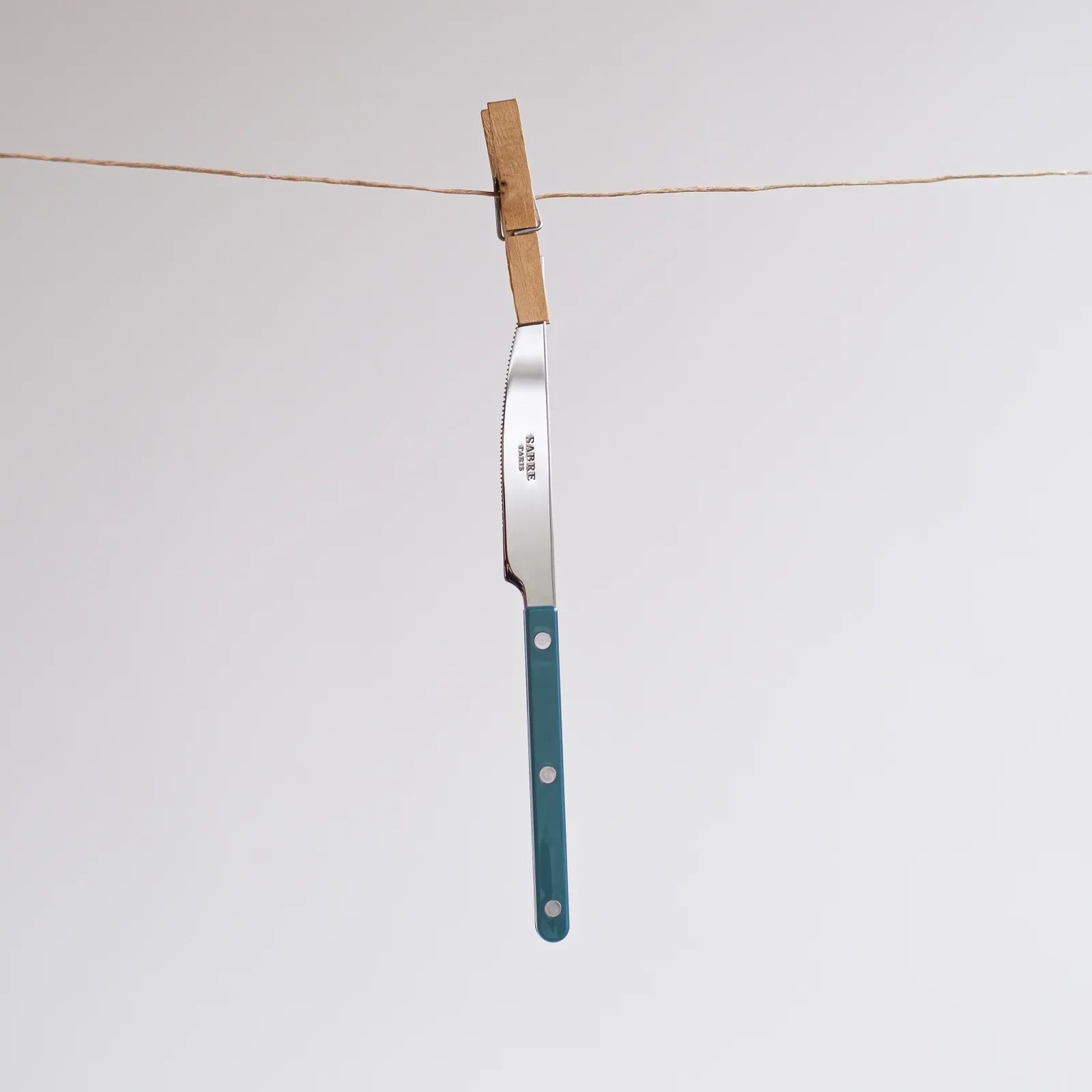 Sabre Paris Shiny Bistrot 4-piece cutlery set in aquamarine, flat lay