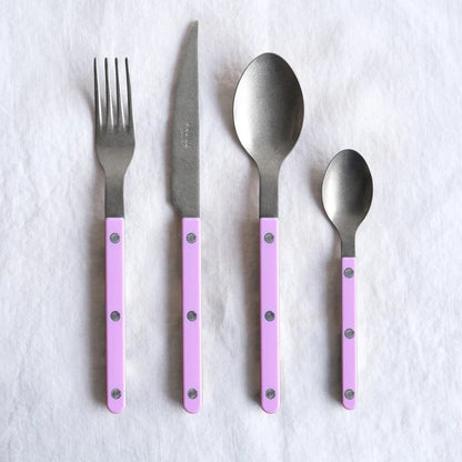 Sabre Paris Vintage Bistrot 4-piece cutlery set in pink, styled on table