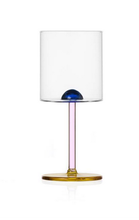 Stylish European design hand made  and flame worked clear wine glass. with a feature blue dot, pink stem and amber base