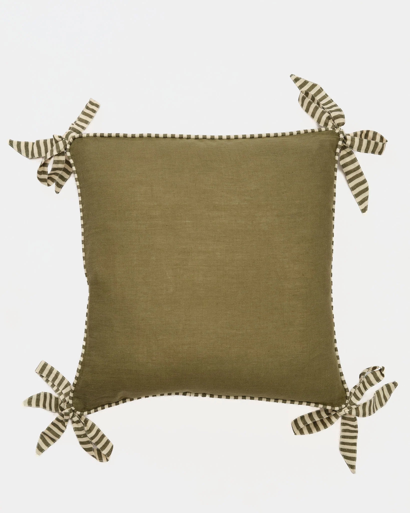 Olive ribbon trim linen cushion cover on a sofa