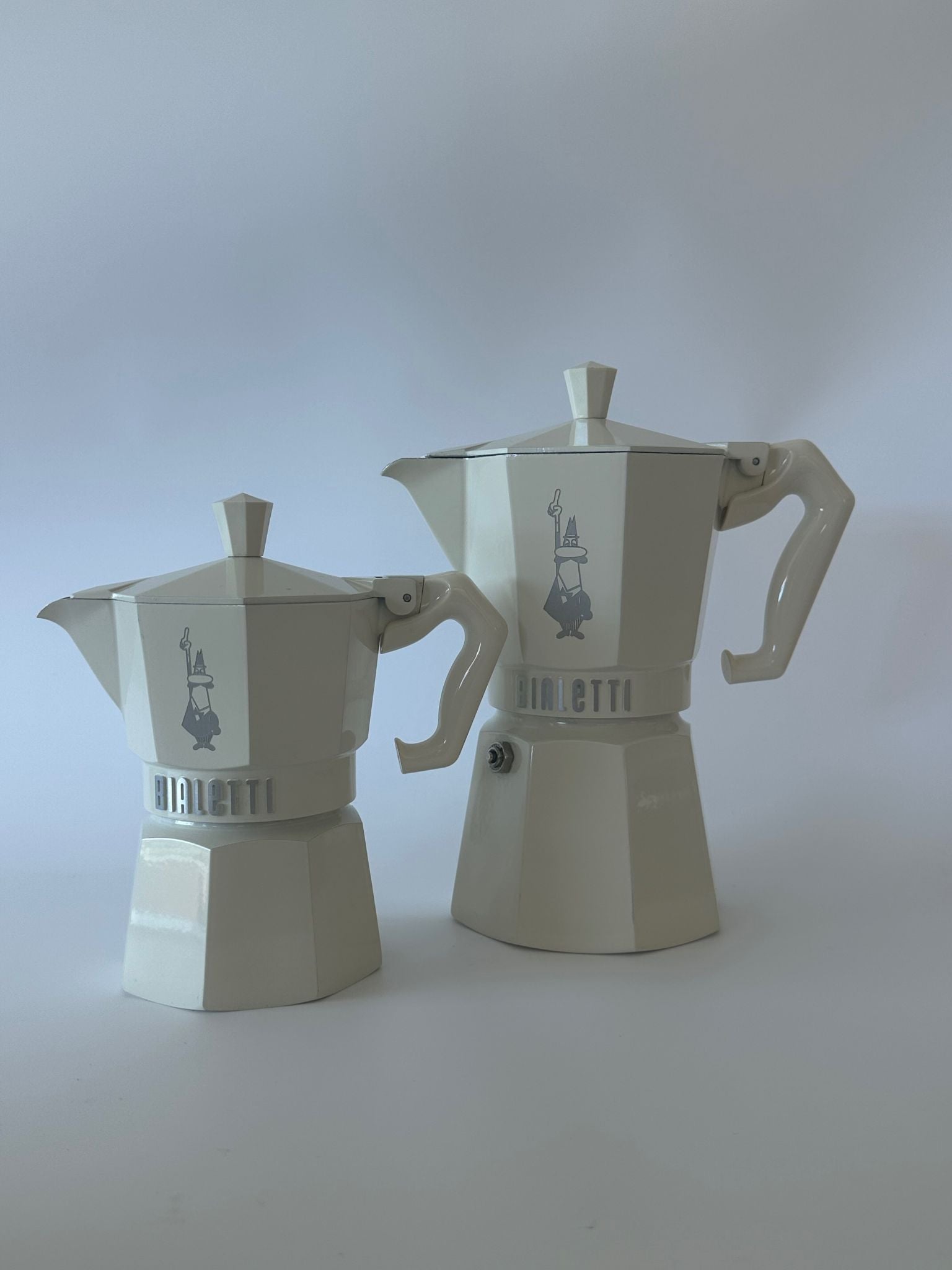 Bialetti Moka Express 6 cup stovetop coffee maker in cream, styled shot