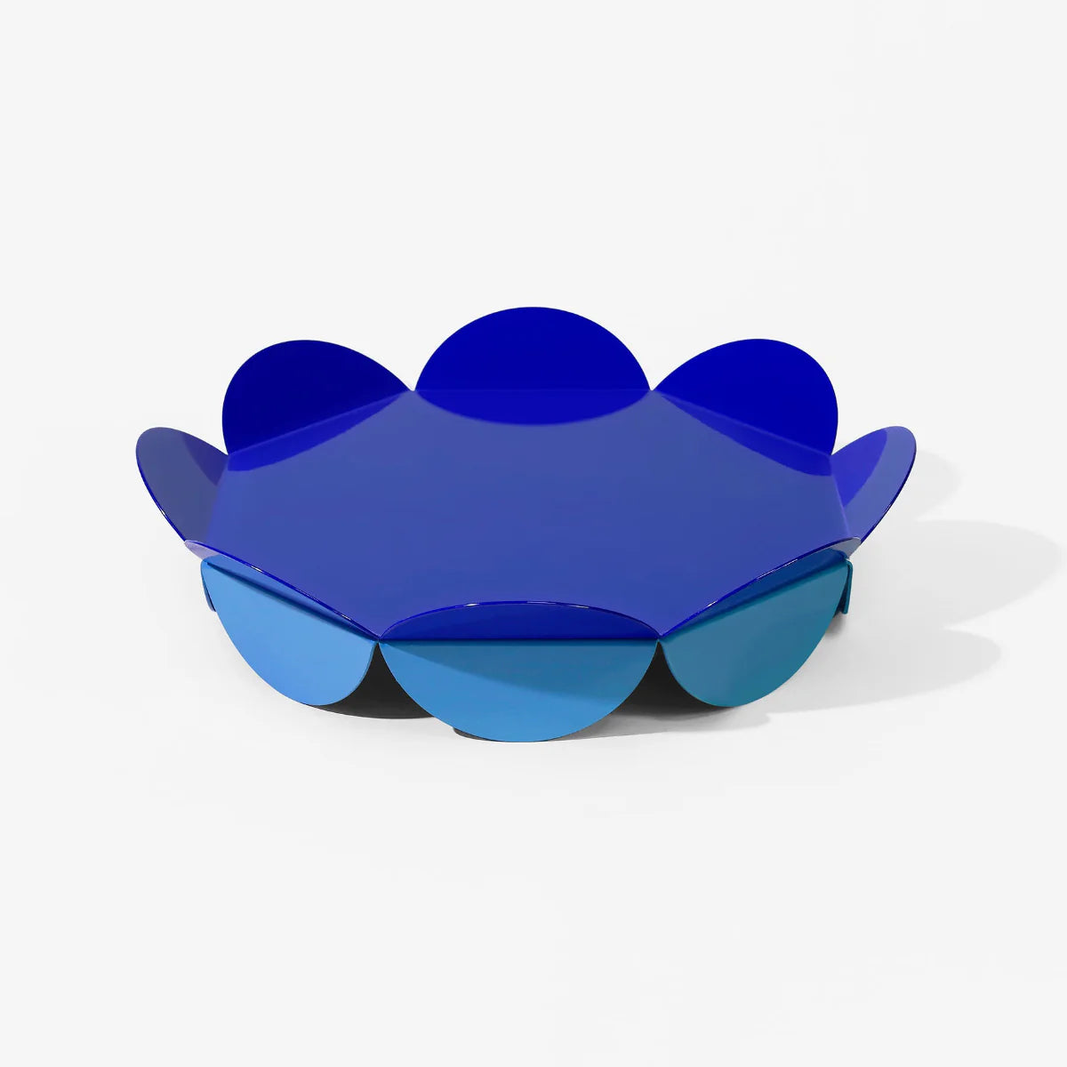 Serving stand with flower petal details blue contrasting tones