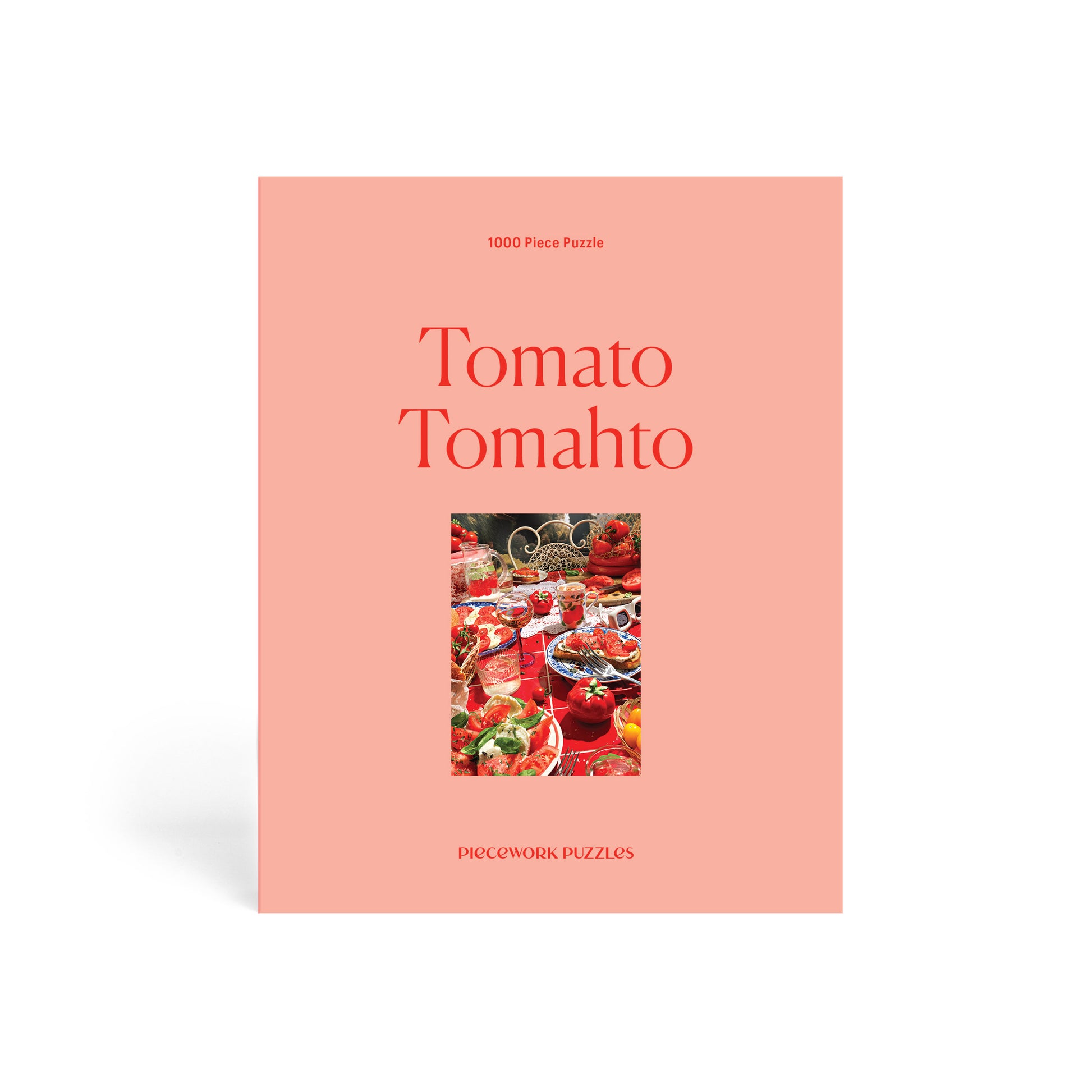 Puzzle box with 'Tomato Tomahto' text and images of tomatoes on a peach background